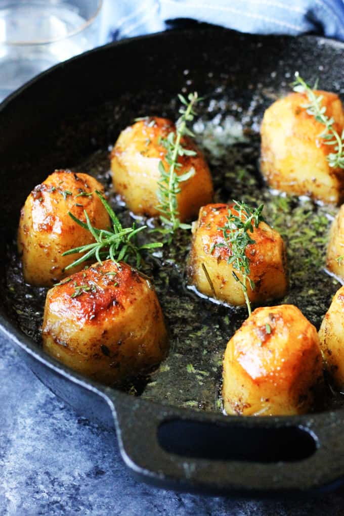 Potatoes Fondant in a skillet with herbs