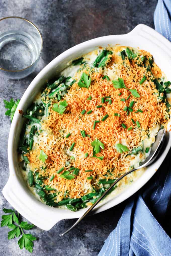 Green bean casserole in white baking dish