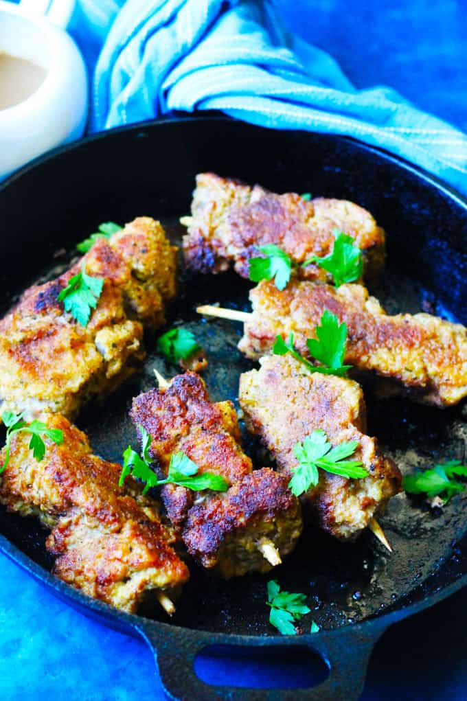 Fake Chicken Breaded Skewers in Cast Iron Skillet