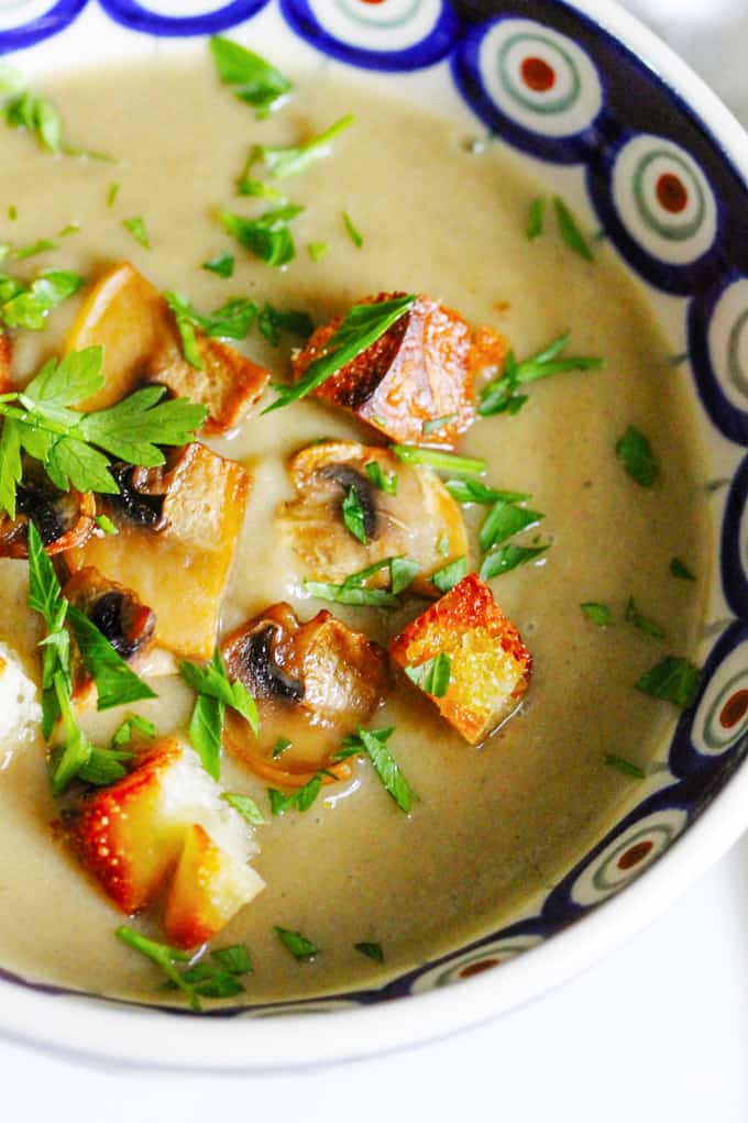 Mushroom Soup with garnishes in a bowl