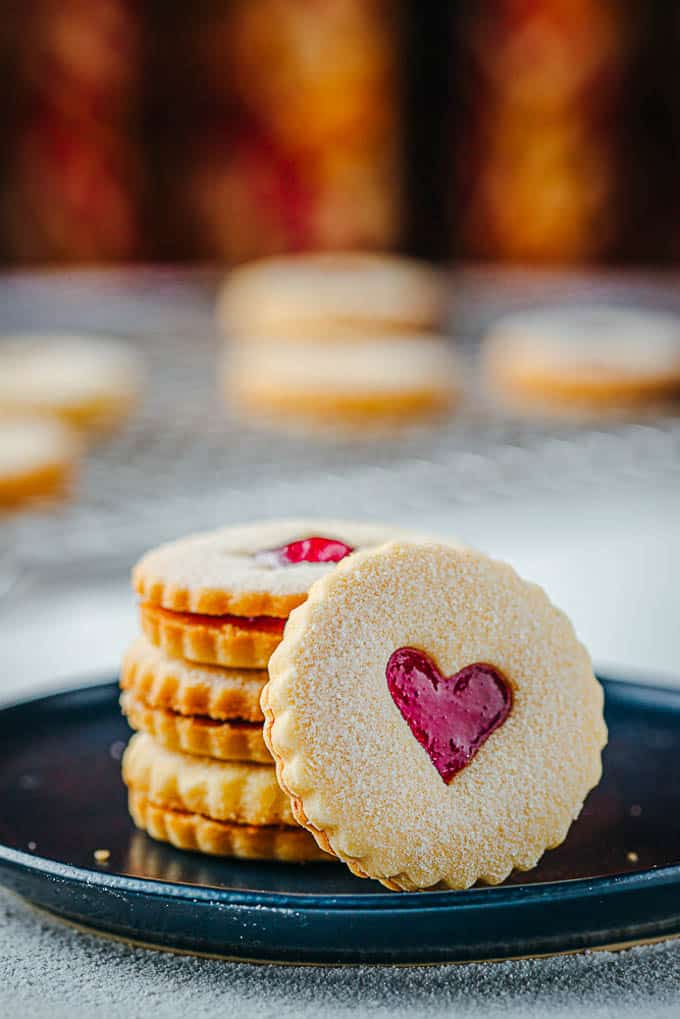 Linzer Round with Heart Shape on a plate against the stock of cookies