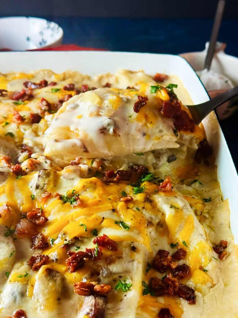 Serving pierogi and kielbasa casserole