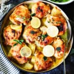 Greek lemon chicken and potatoes in a skillet
