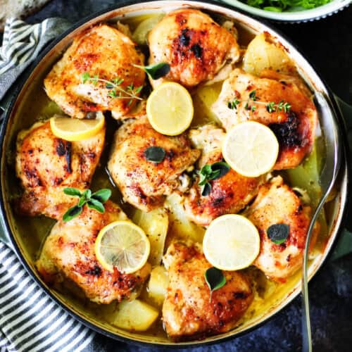 Greek lemon chicken and potatoes in a skillet