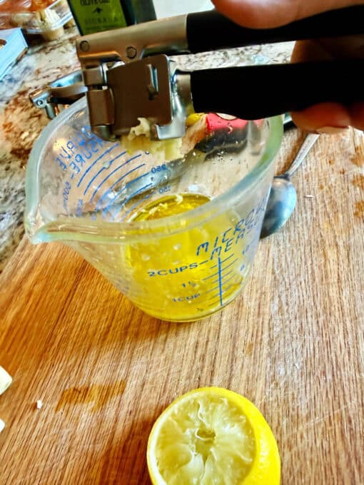 Garlic being added to the sauce