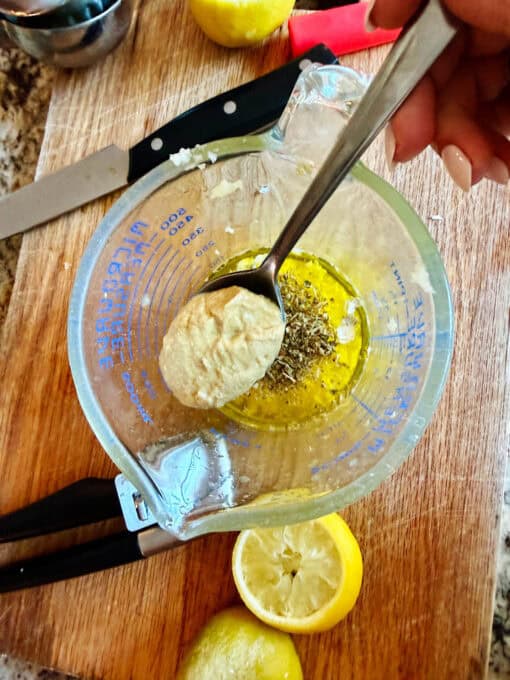 Adding a spoonful of Dijon Mustard
